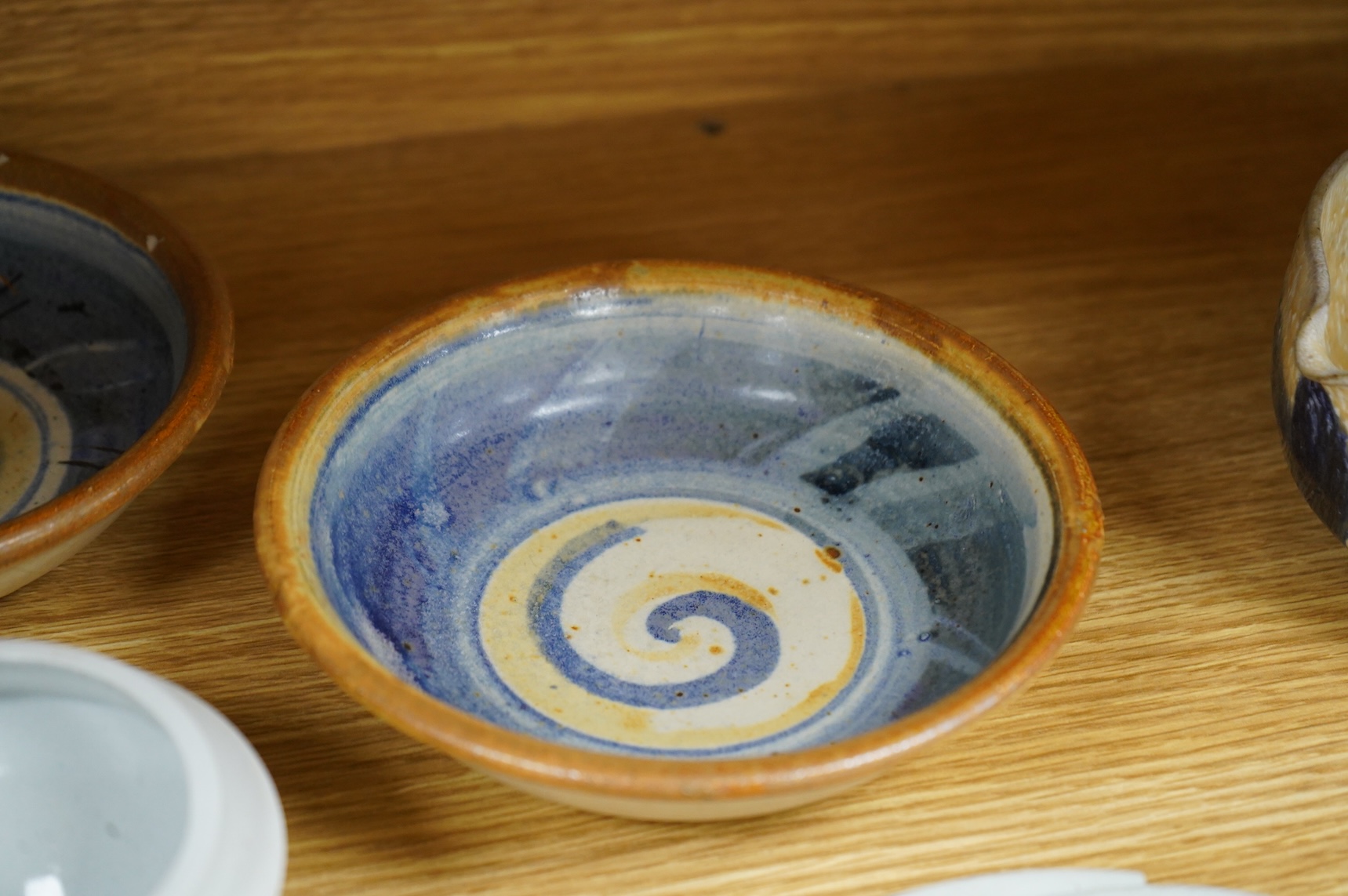 A collection of studio pottery to include crystalline glazed works by Stephen R Jones Des, Brighton, vases and a pair of dishes, largest 22cm high
